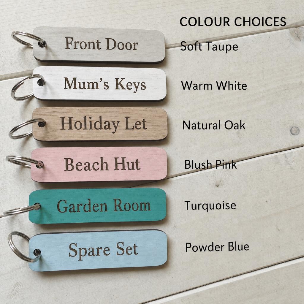 Colour options for rectangular personalised school bag keyrings.