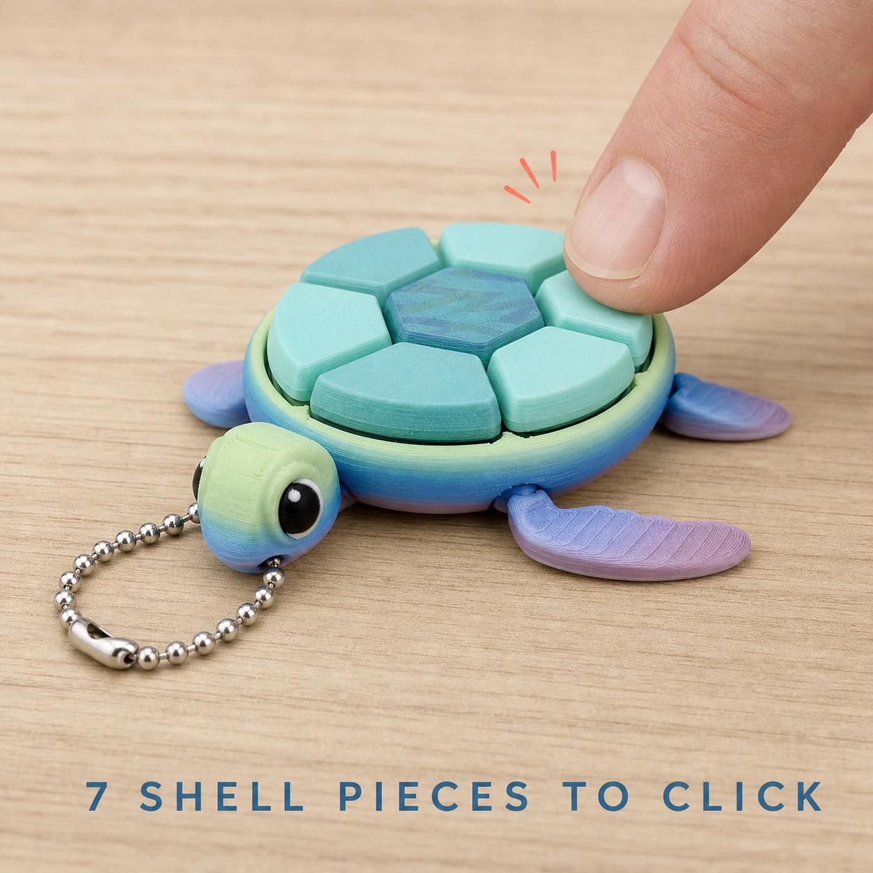 A finger visibly pressing one of seven shell buttons on the sea turtle clicker.
