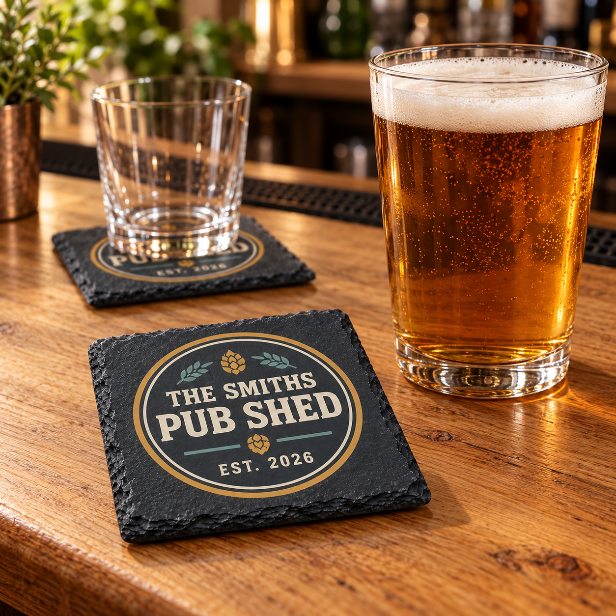 Digital product mockup of personalised home bar slate coasters, full colour man cave and pub shed gift, home bar lifestyle.